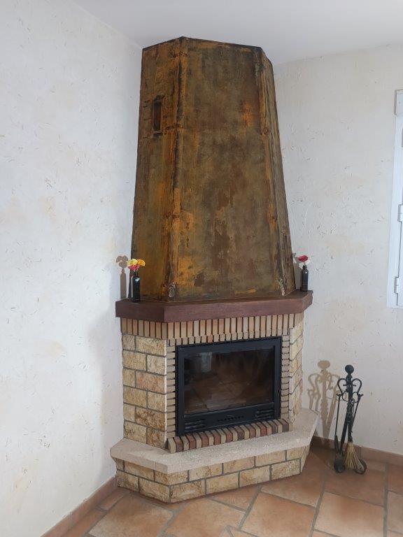 Chimenea transformada con efecto óxido